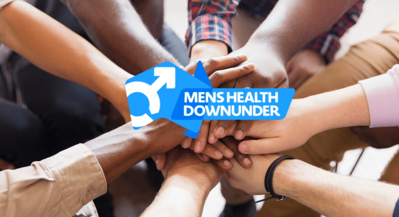 Group of hands all reaching in at once to signify togetherness